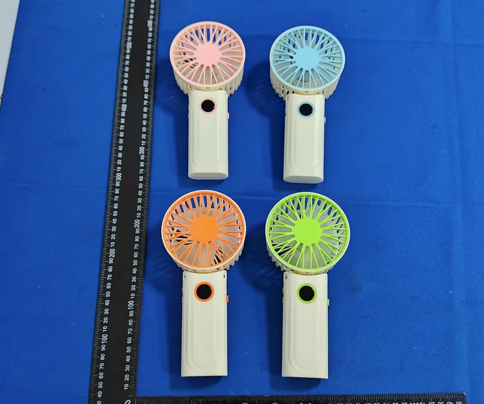 Quality control inspection - 100% functional testing of portable fans before packaging