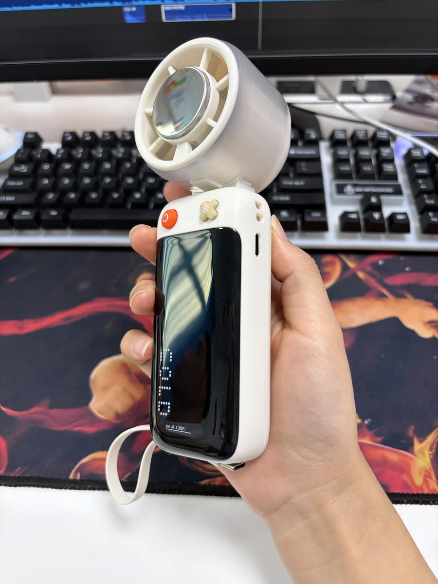 ZH-F2 Handheld Ice Cooling Fan - Detail View 3 - rotating display